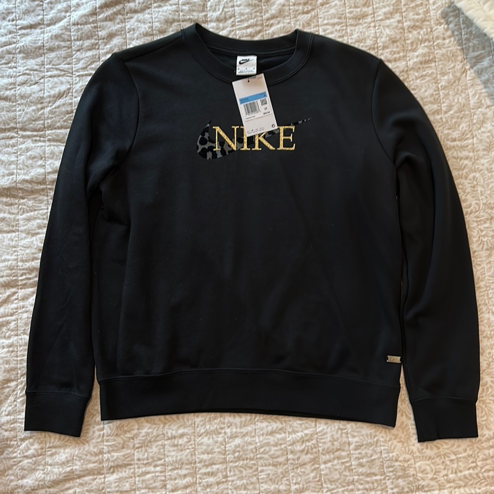 Women’s black Nike crew neck